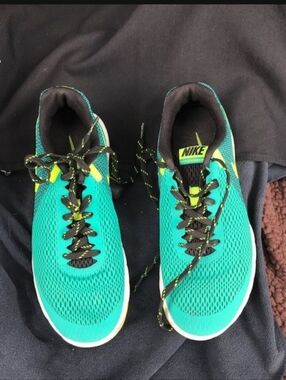 Green nike running sneakers